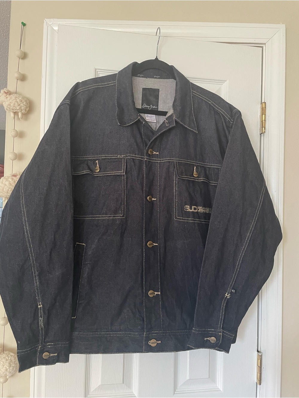 Vintage Sean John black denim jacket with white stitching, size L. Cotton constr